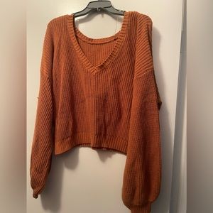 Off the shoulder orange sweater